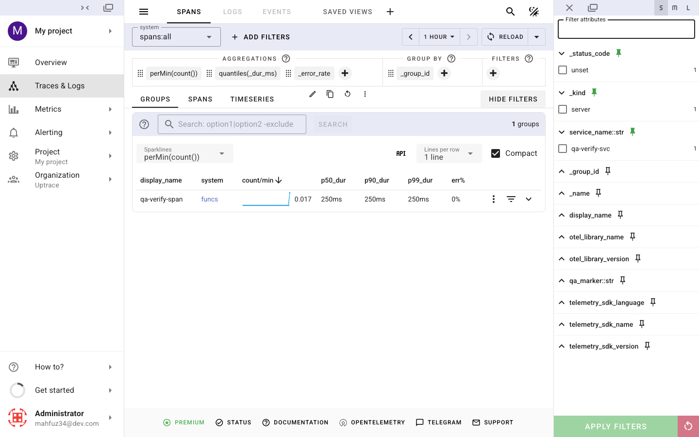 The Uptrace spans list with a grouped test trace and attribute filters